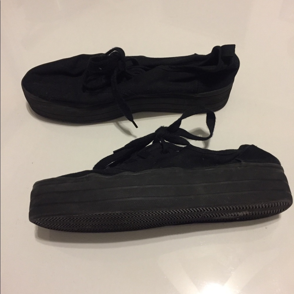 Black platform sneakers